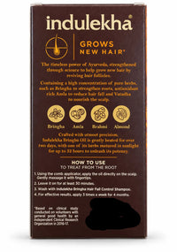 Indulekha Bringha Hair Oil box showing scalp application directions