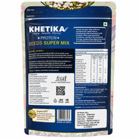 Back view of a Khetika Seeds Super Mix protein powder pouch, featuring a dark blue label with white and yellow text, nutritional facts, ingredients, and a barcode.