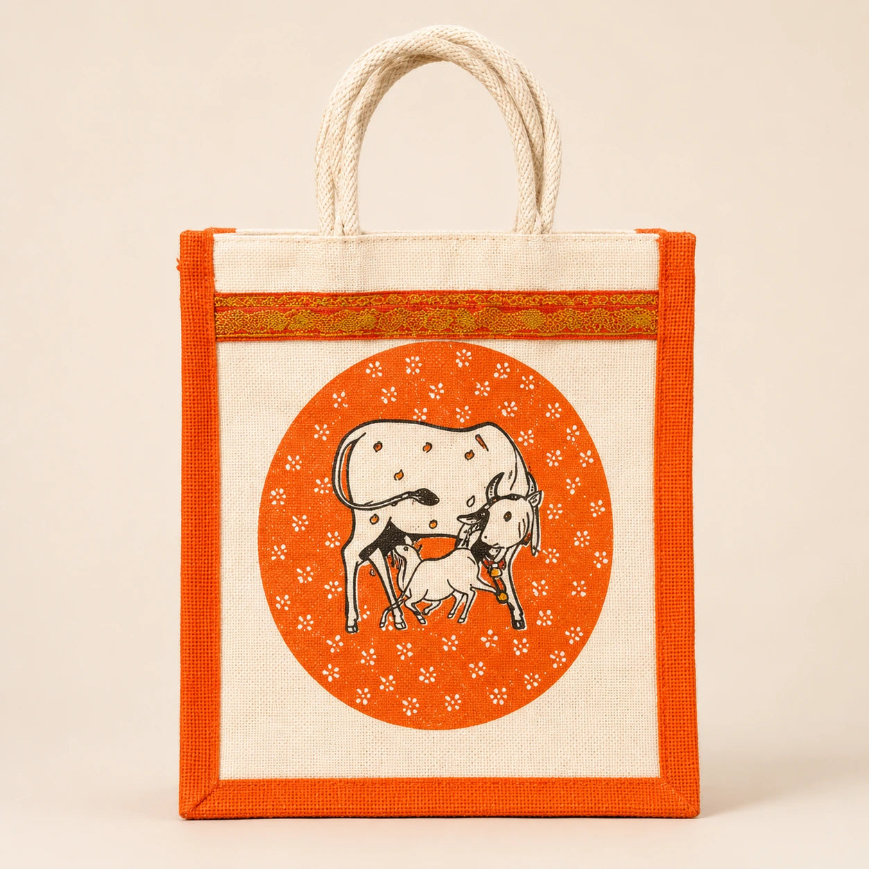 Orange bordered jute return gift bag with cow and calf design and rope handles
